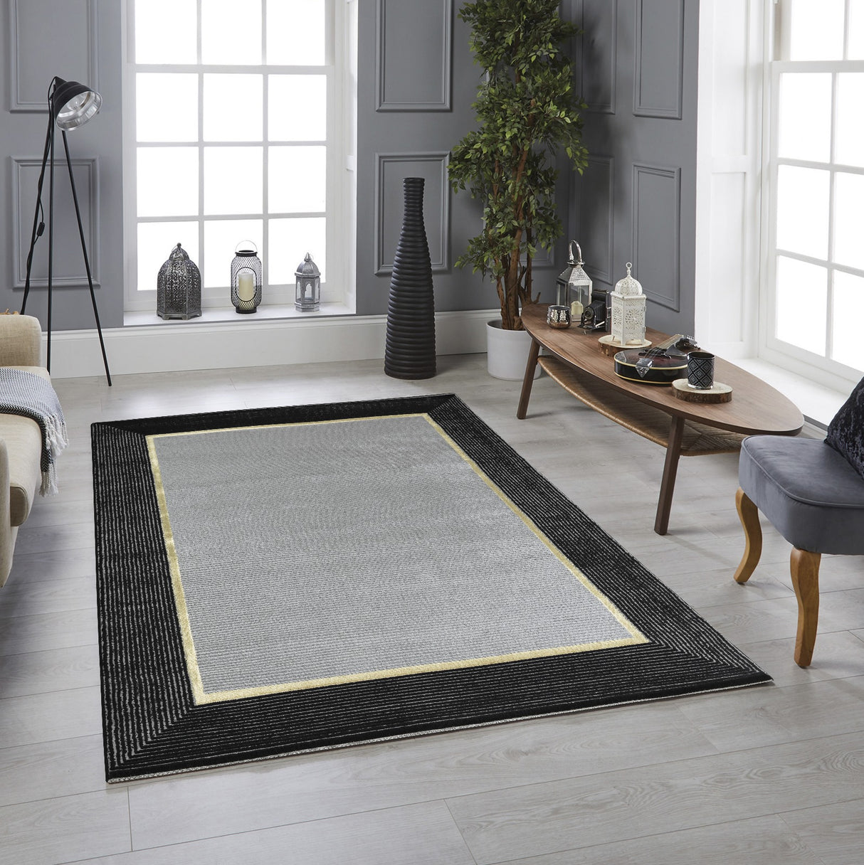 .Ashen Gray Rug with Black & Gold Border – 6' 6" x 9' 0"