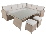 Outdoor furniture set with a sectional sofa, glass-top table, and stools on a white background