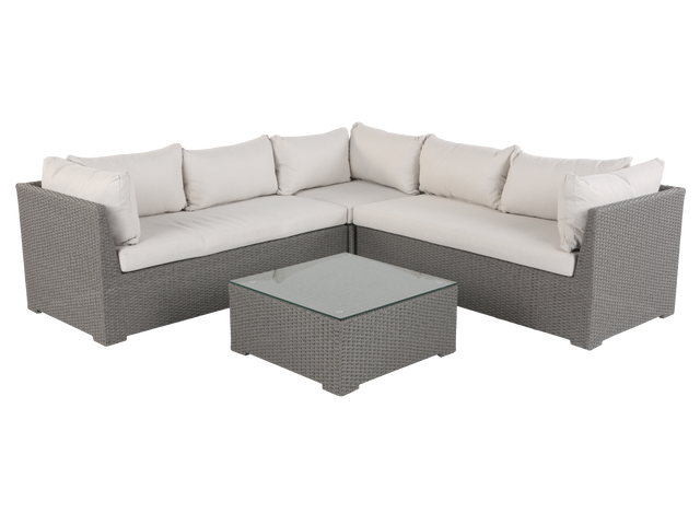 Sectional outdoor sofa with cushions and a coffee table on a white background