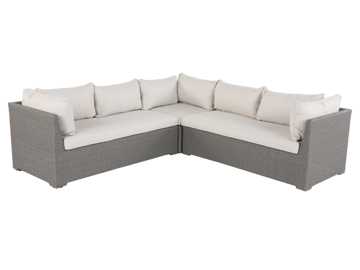 Sectional outdoor sofa with beige cushions on a white background