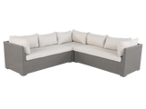 Sectional outdoor sofa with beige cushions on a white background