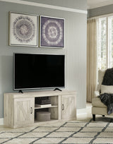 Bellaby - Whitewash - TV Stand With Faux Firebrick Fireplace Insert by Signature Design by Ashley® | Bel Furniture
