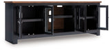 Wildenauer - Brown / Black - XL TV Stand With Fireplace Option by Signature Design by Ashley® | Bel Furniture
