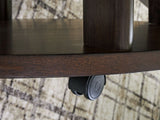 Korestone 2 - Dark Brown - Round Cocktail Table by Signature Design by Ashley® | Bel Furniture