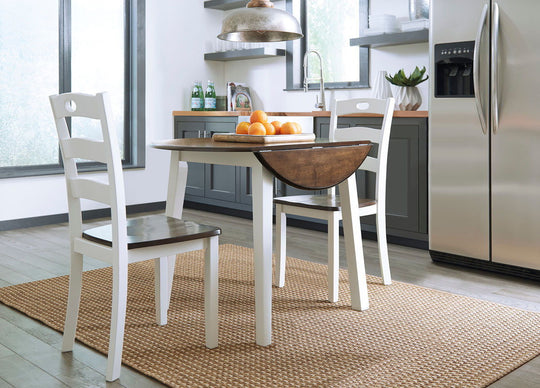 Woodanville - Round Dining Table Set Light Brown 3 Pc. - Round Dining Room Drop Leaf Table, 2 Side Chairs by Signature Design by Ashley® | Bel Furniture