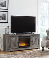 Wynnlow - Gray - 63" TV Stand With Glass/Stone Fireplace Insert by Signature Design by Ashley® | Bel Furniture