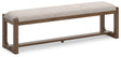Cabalynn - Oatmeal / Light Brown - Large Uph Dining Room Bench by Signature Design by Ashley® | Bel Furniture
