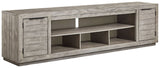 Naydell - Gray - XL TV Stand w/Fireplace Option by Signature Design by Ashley® | Bel Furniture